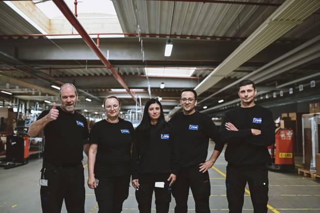 Colleagues in the warehouse in one of the JYSK Distribution Centres